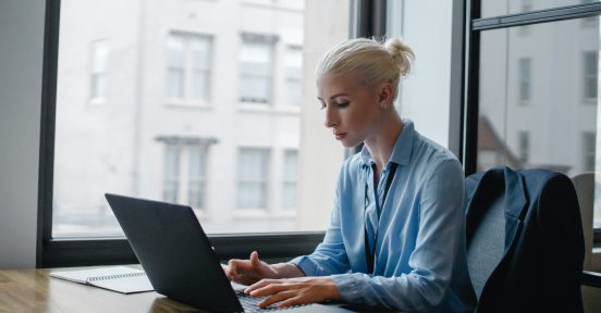 Woman working on IT digital consulting services for enterprise